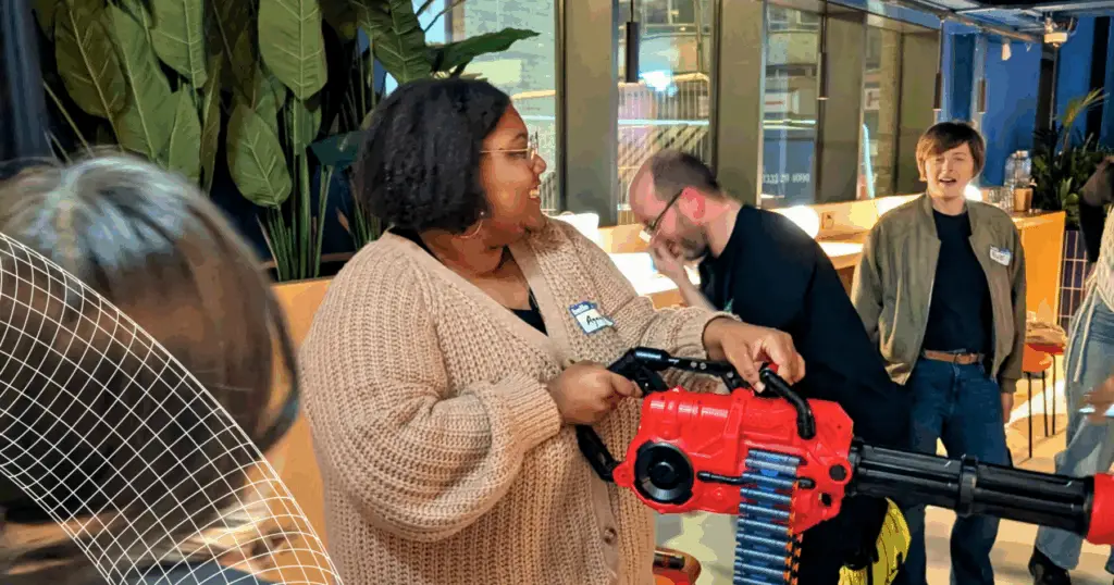 Girl shooting a NERF gun